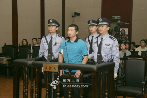 图片说明：杨佳在庭审现场
